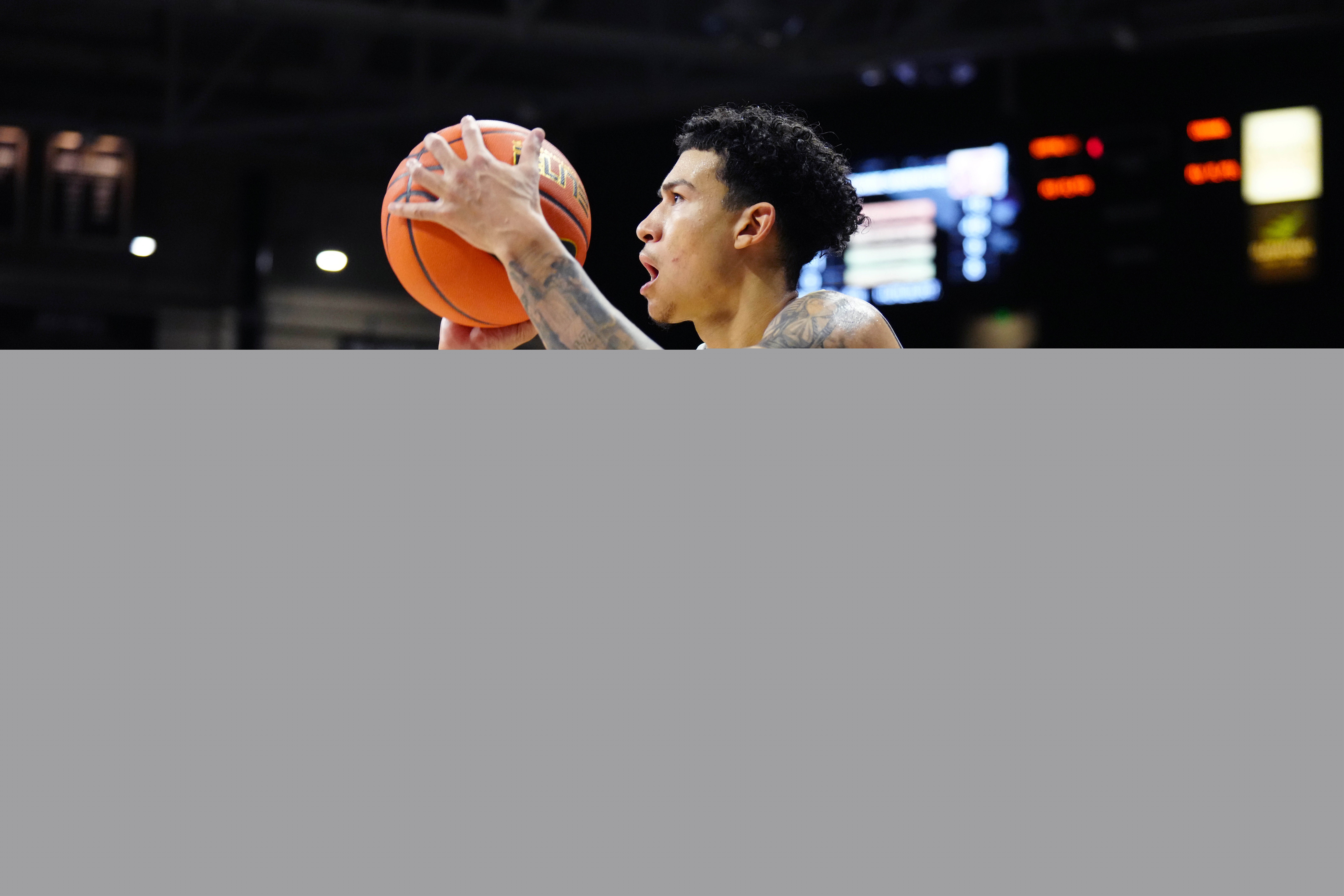Colorado Buffaloes guard KJ Simpson (2) lines up a shot in the second half against the Washington State Cougars at the CU Events Center